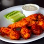 Buffalo Wings - 10 chicken wings in buffalo sauce, celery & blue cheese dressing